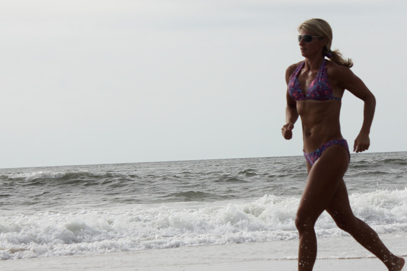 Steph running on beach